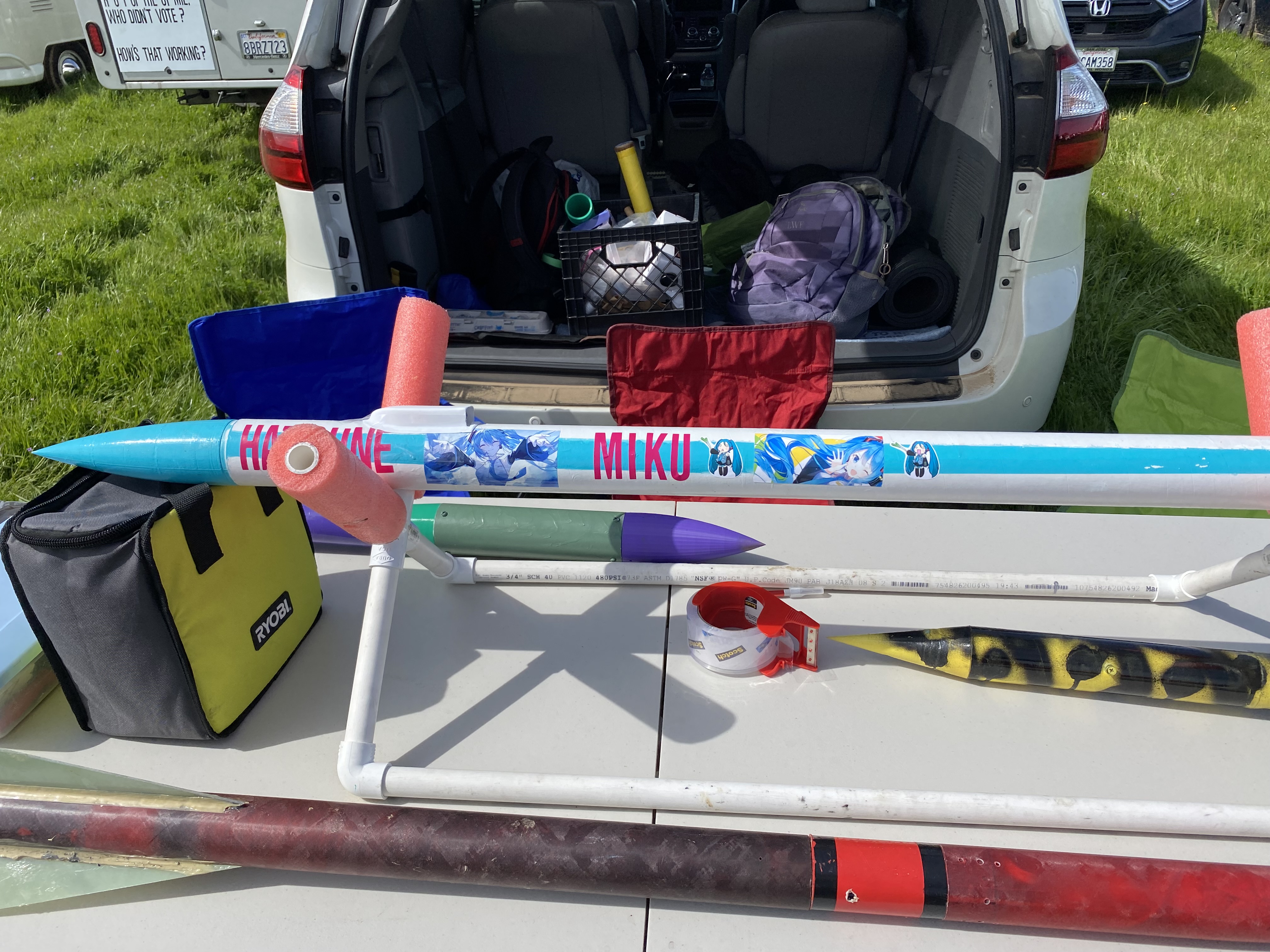 Collection of various model rockets on display table